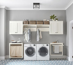 Laundry room with a lot of cabinet storage 