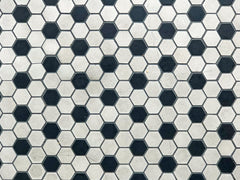 Close up of hexagonal black and white tile floor