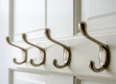 Close up of hooks on the back of a door