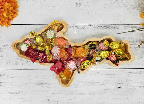 upper peninsula shaped wood tray filled with prewrapped candies, yooper, upper michigan gift