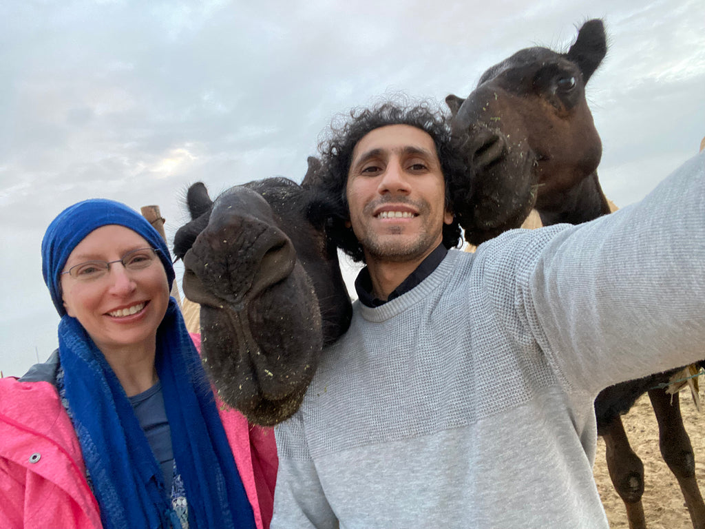 Ahmed and Katie with camels