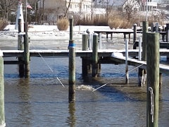 Ice Eater suspended between two docks.