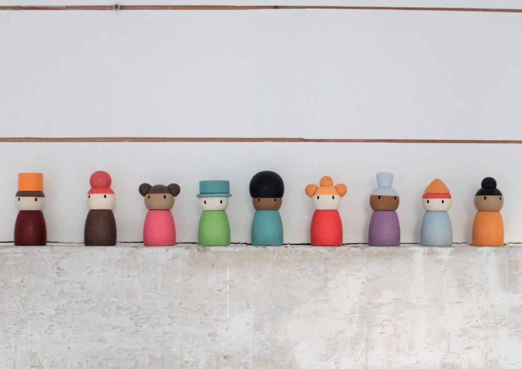 A line of peg people