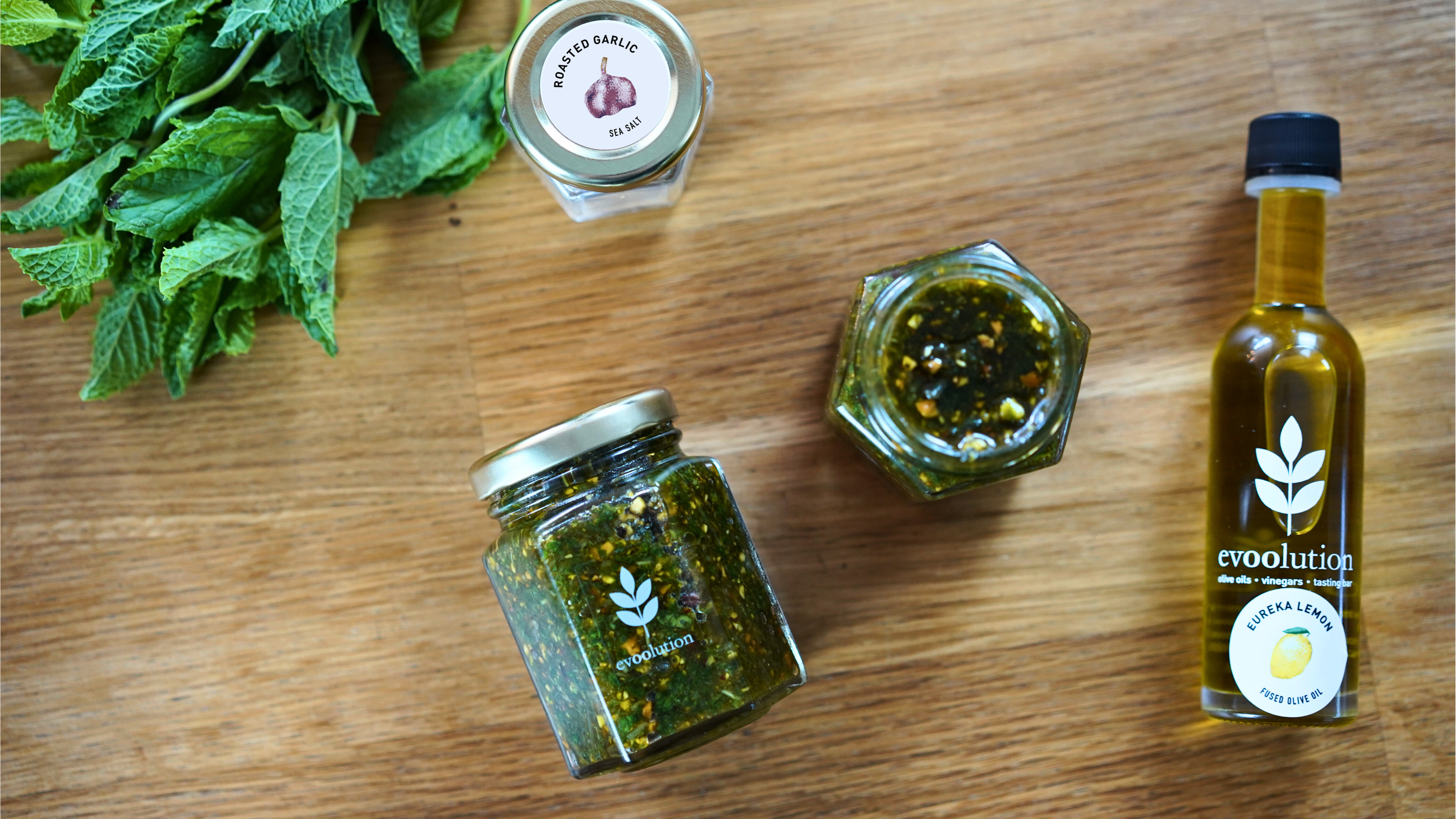 Pistachio mint pesto is packed in an empty salt jar and ready for the freezer.