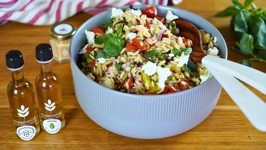 A bowl of grilled vegetable and orzo salad