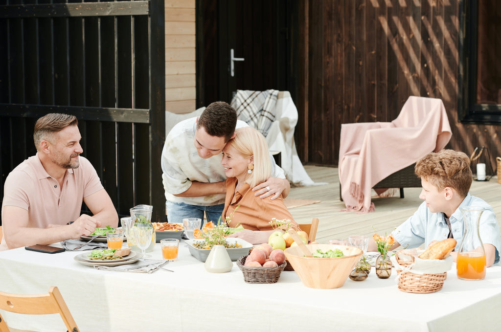 A family dines outside