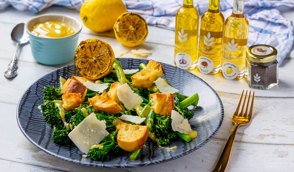 A bowl of grilled broccolini caesar salad