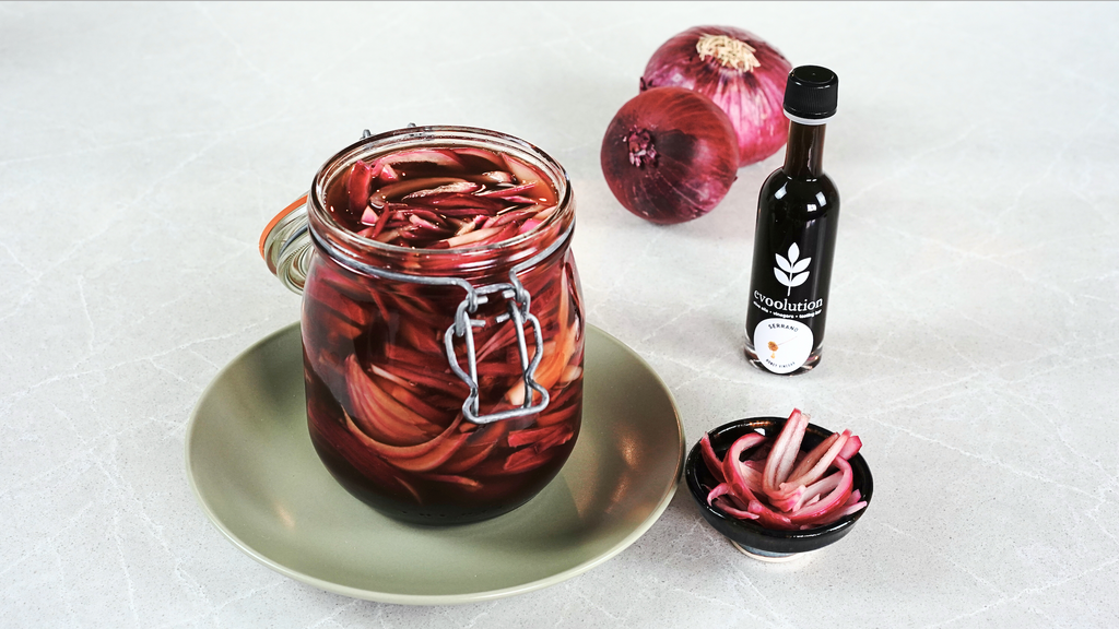 A jar of serrano honey pickled red onions