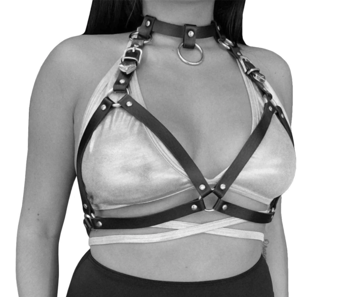 woman wearing leather body harness