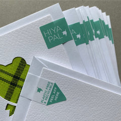 greeting cards packaged with a recyclable paper seal