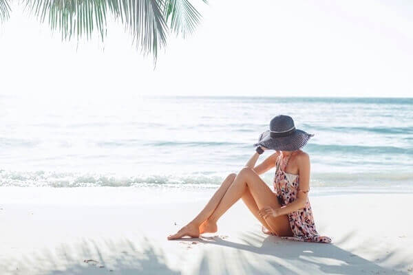 Woman chilling on the beach