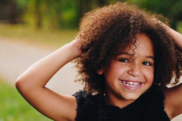 Little girl with kinky hair