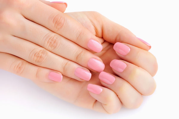 Nails with pink nail polish