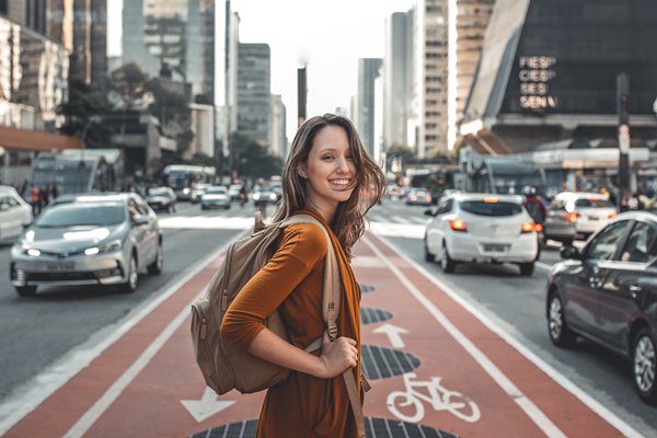 Woman smiling on the street who used anti-pollution skin care