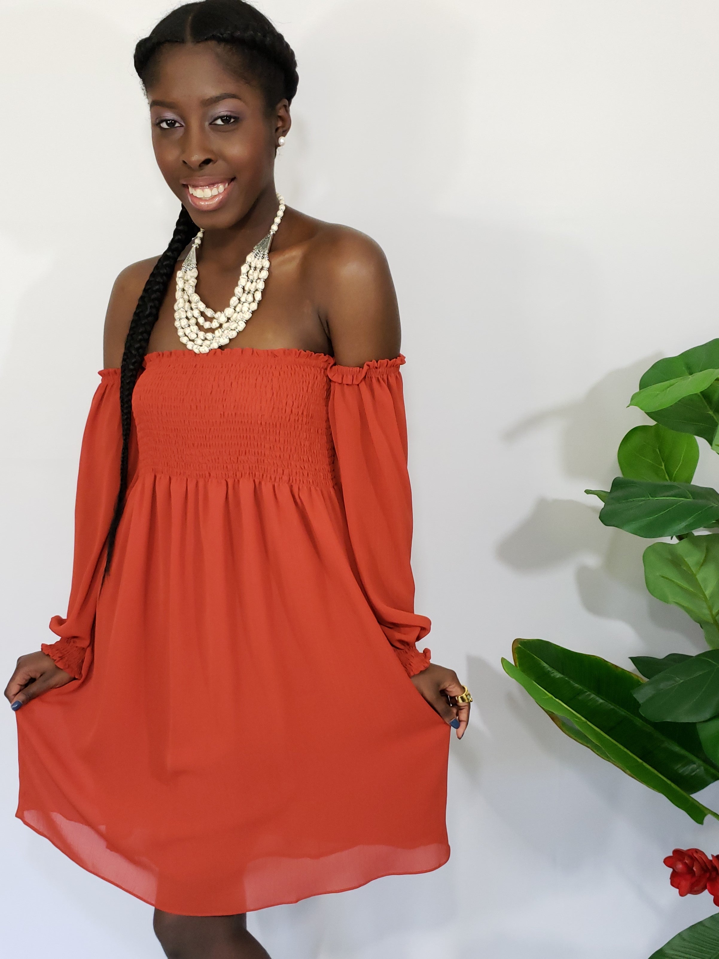 burnt orange off the shoulder dress