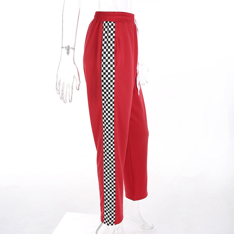 red sweatpants with white stripe