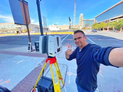 3D Laser Scanner or Robotic total station with man standing near