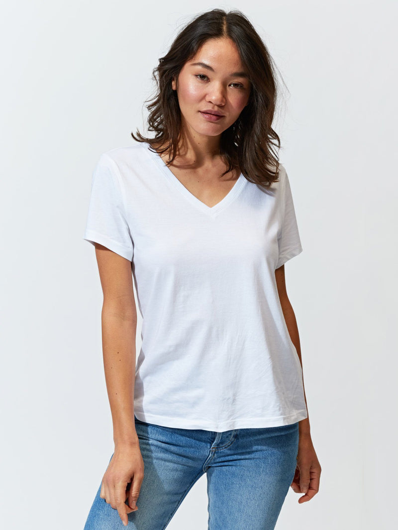 Women’s Invincible V-Neck Tee in White – Threads 4 Thought