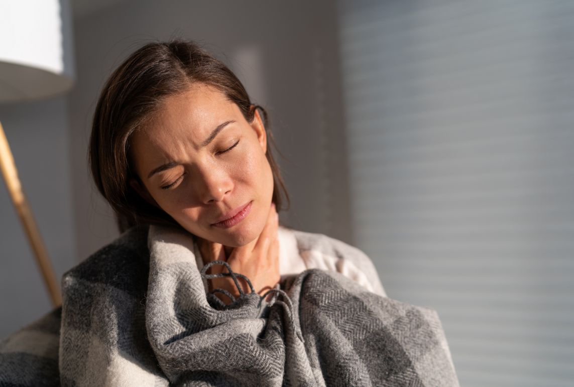 Women wrapped in a blanket