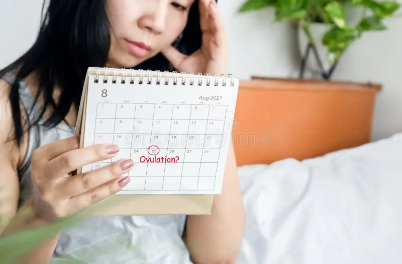 Young women looking at a calendar