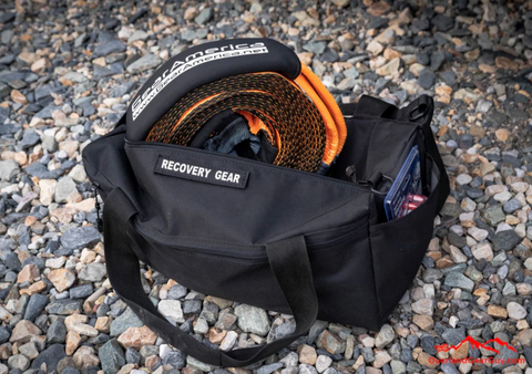 Overlanding recovery bag tool kit on gravel