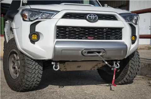 white toyota tacoma with front bumper winch accessory