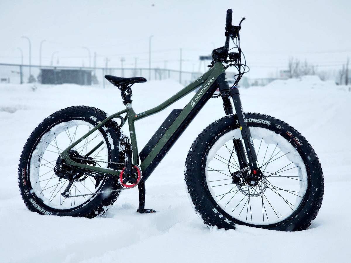Fat-tire Surface604 eBike parked in snow