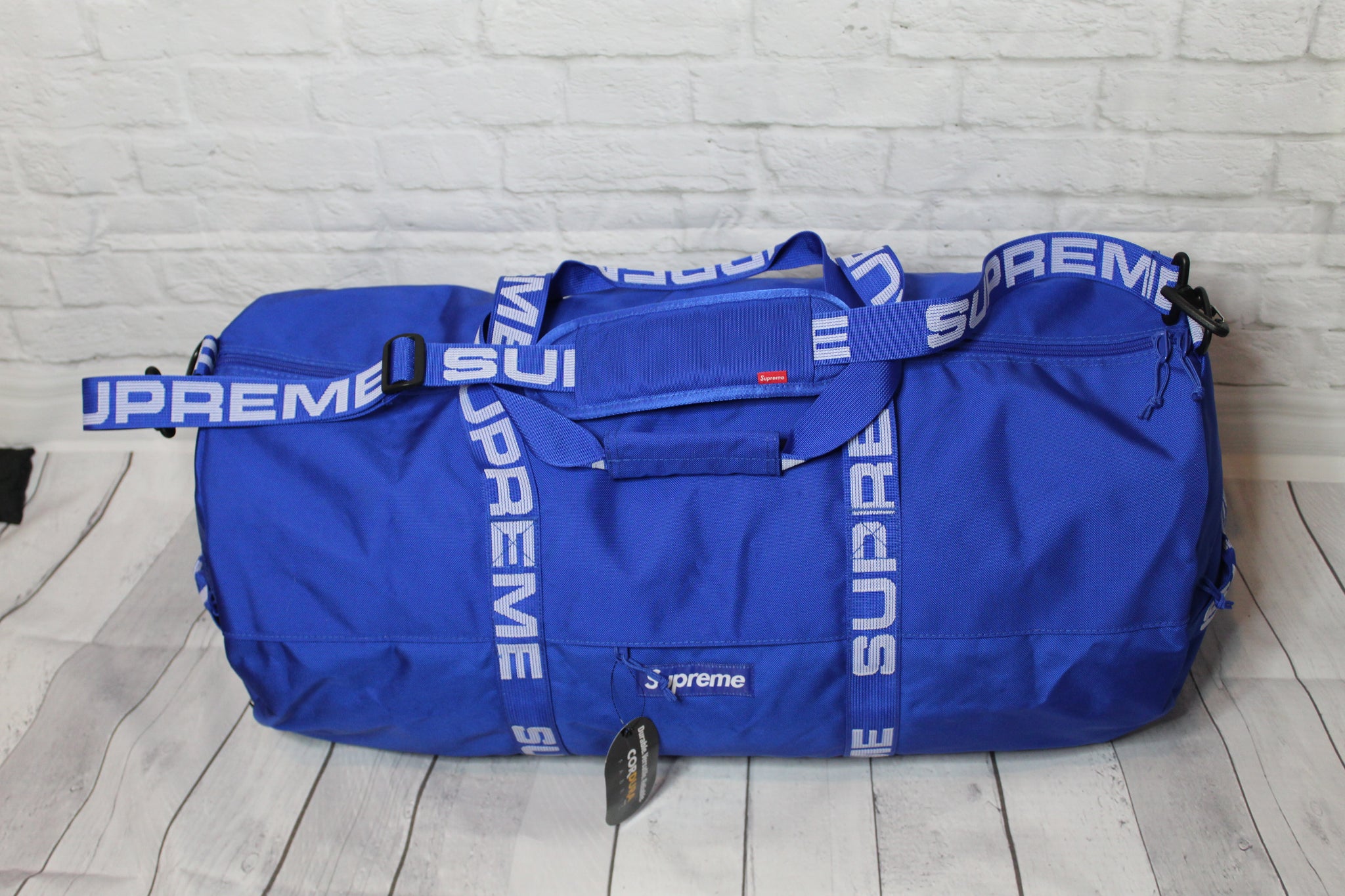 blue supreme duffle bag