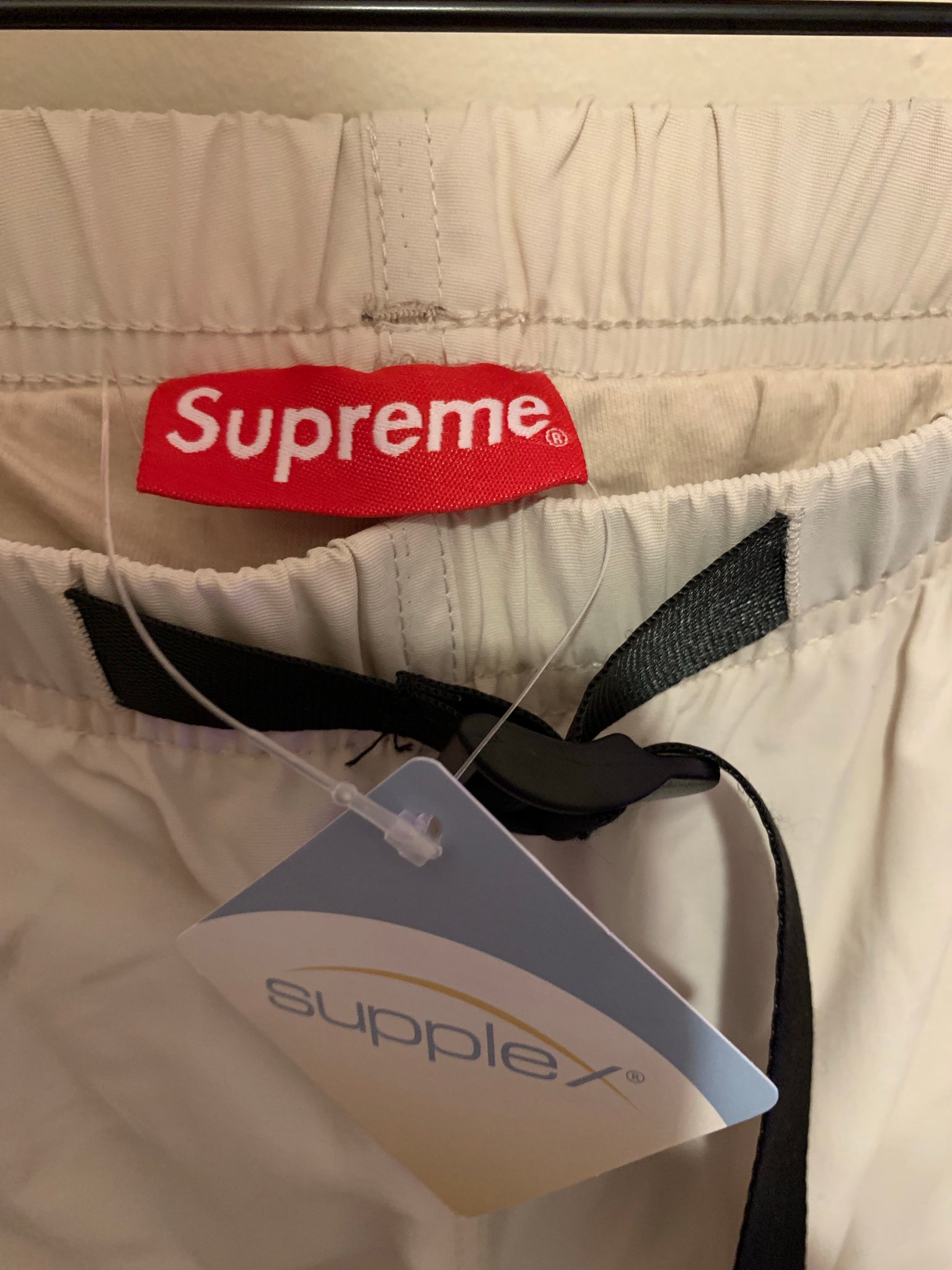 supreme s paneled belted track pant