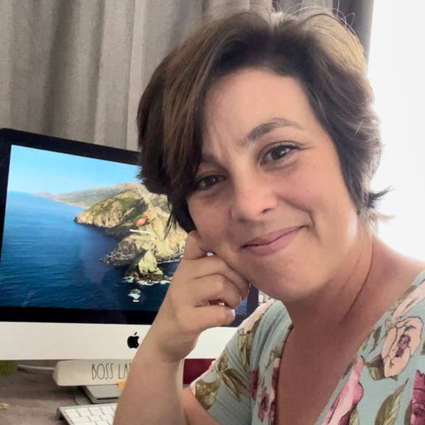 Natasha Twisselman sitting at her computer ready for the next meeting.