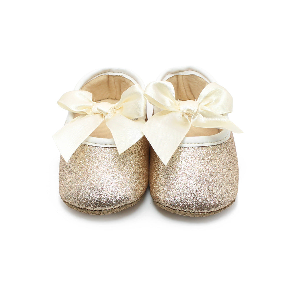 gold baby shoes