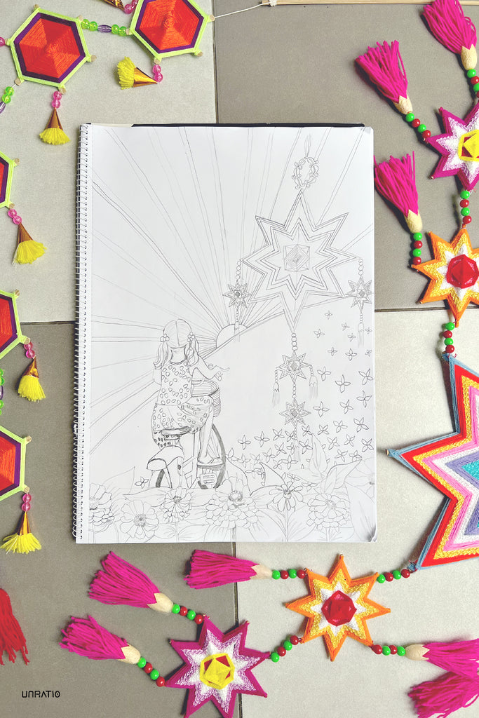 Sketchbook with a black and white line drawing of a woman riding a bicycle, surrounded by handmade colorful star lanterns, reflecting the vibrant artistry of Chiang Khan.