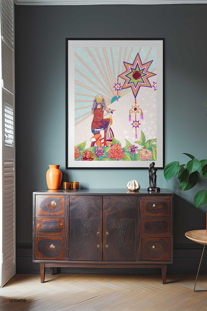 Colorfully illustrated framed artwork of a girl reaching for a star, adding a pop of whimsy to a stylish room, embodying the joy and nostalgia of Chiang Khan.