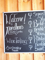 Needham's Market Garden welcome sign