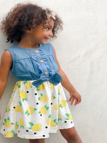 a bright dress with a lemon motif