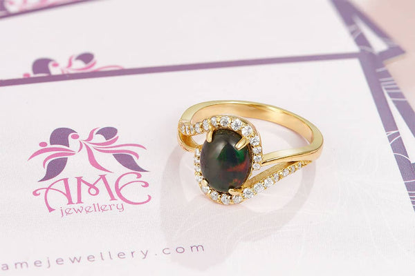 oval black opal gold ring by AME Jewellery