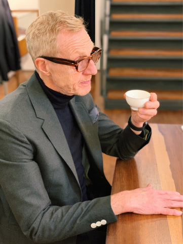 Philip Start drinking tea in the Mr. Start store in Shoreditch for menswear tailoring 