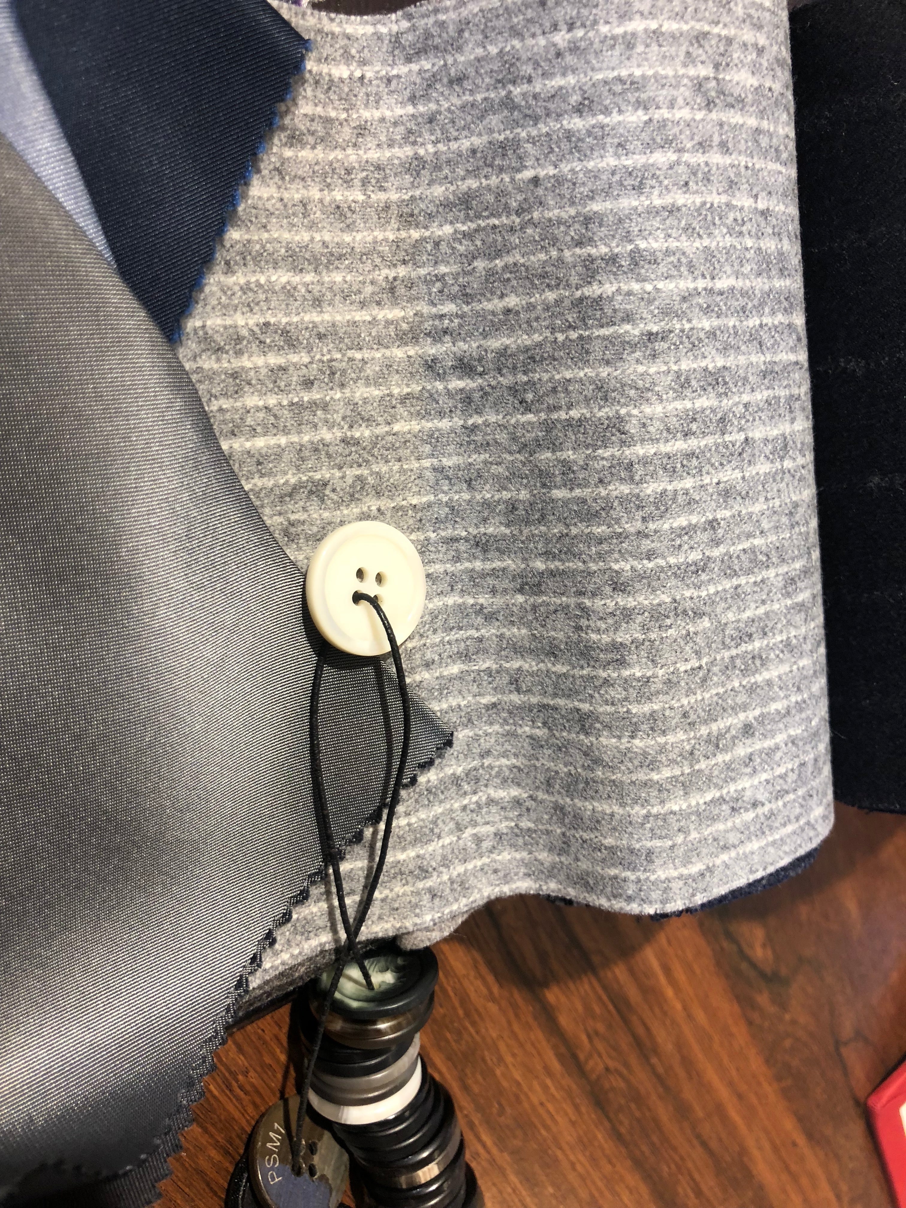 Italian Lightweight Flannel in Grey Fine Chalk Stripe, a Complimentary Lining and Mother of Pearl Button, all chosen by Alistair with the expert advice from Philip.