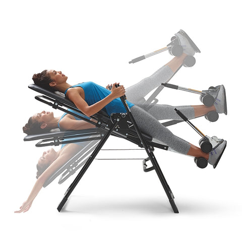 Women's entire body reclined back using the Mastercare Back-A-Traction Inversion Table