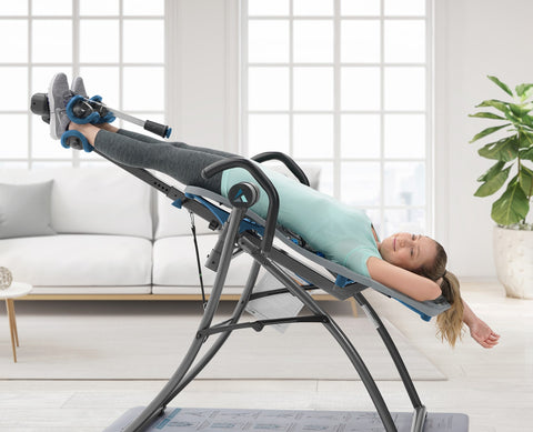 A female using the XC5 inversion table
