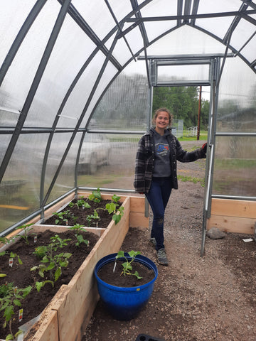 Houston Family Resource Centre Community Garden Volunteer in the Greenhouse