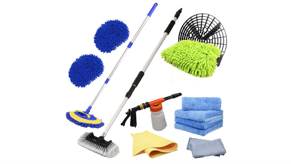 Complete car wash and detailing kit including microfiber pads, extendable handles with cleaning heads, a grit guard with green wash mitt, foam cannon, various microfiber towels, and brushes.