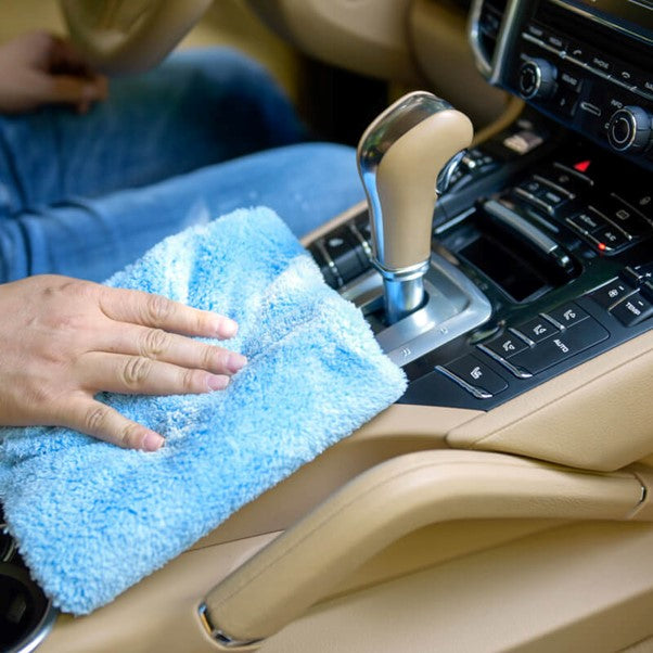 Showing Edgeless Coral Fleece Microfiber Towel is use to clean car Interiors Blog image