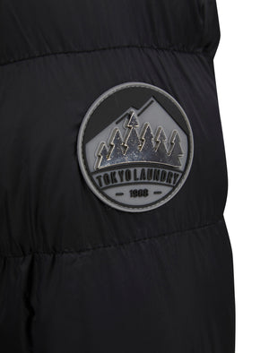 Markle Quilted Hooded Puffer Jacket in Black - triatloandratx