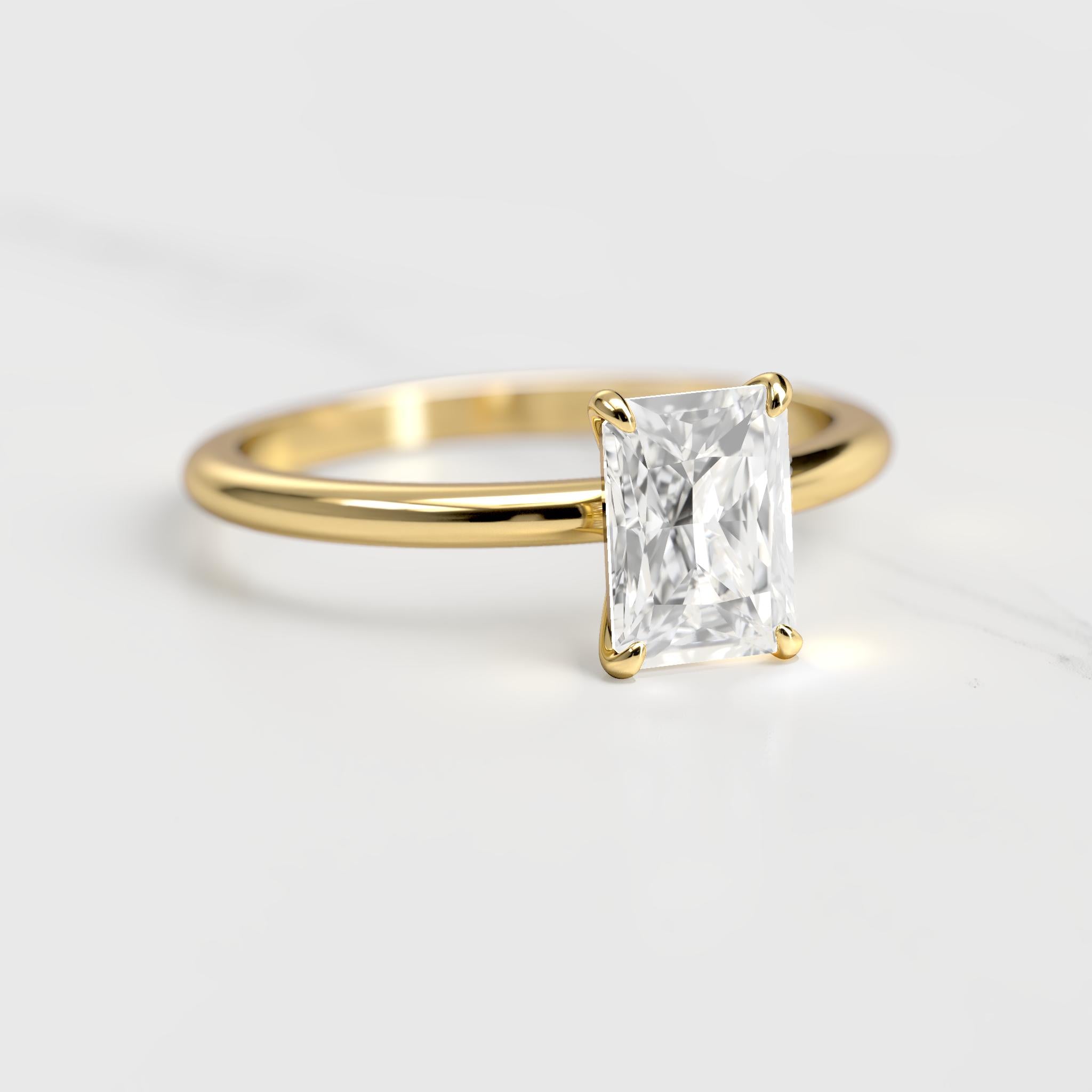 Radiant Tapered Solitaire Diamond Ring - 18k white gold / 0.75ct / natural diamond