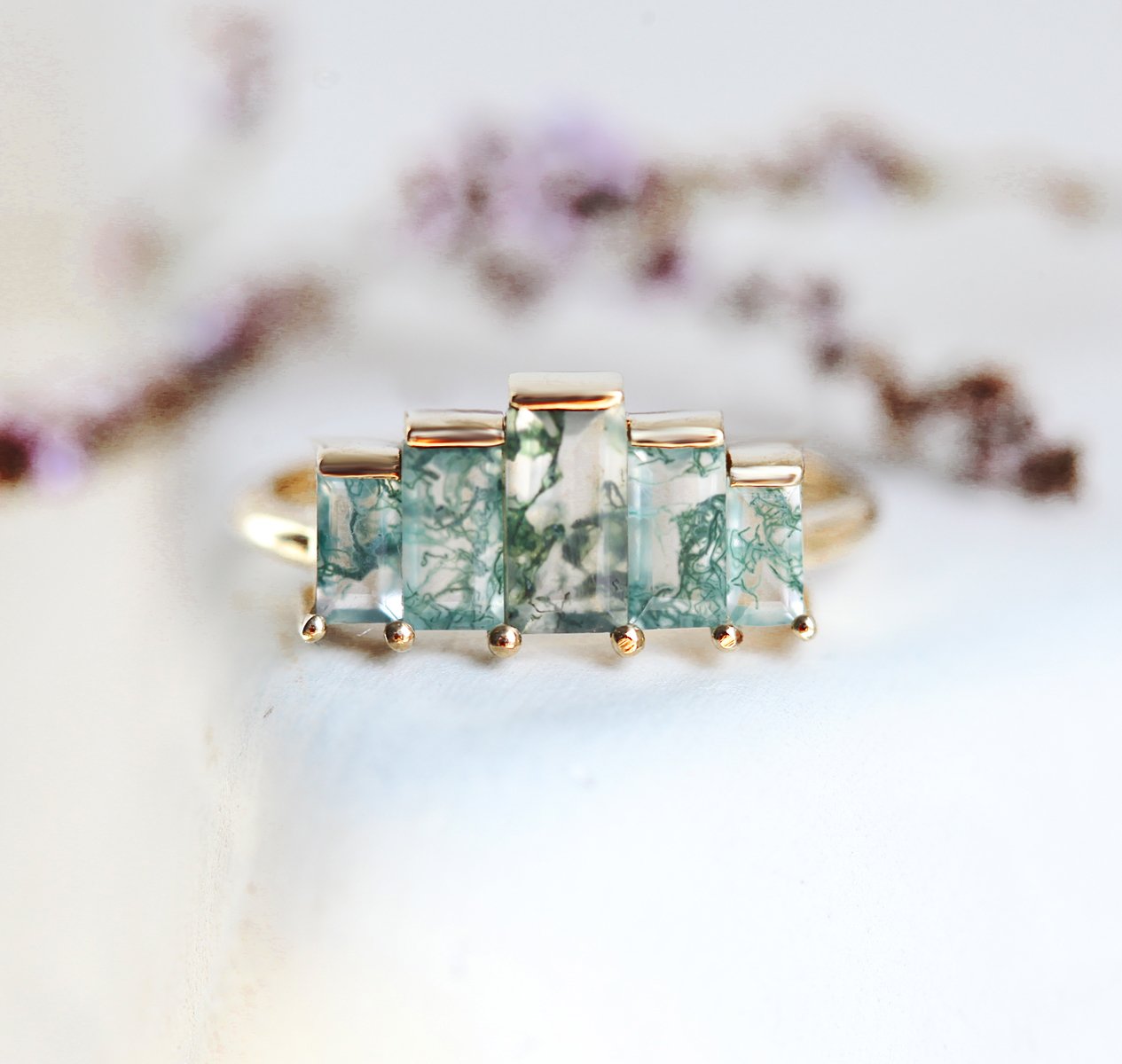 Agatha ring with custom cut baguette moss gemstones