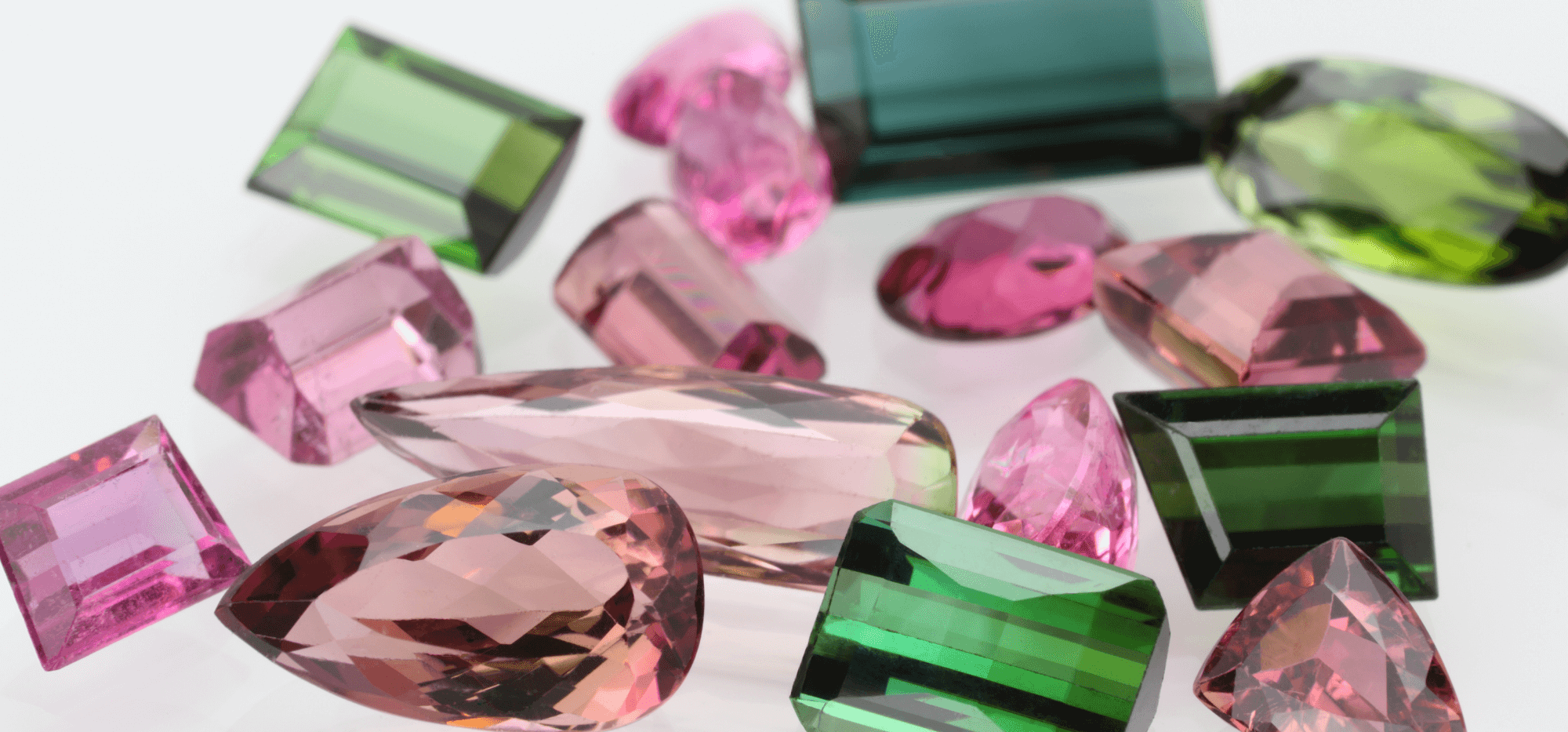 Various cuts and shapes of Tourmaline gemstones in different hues