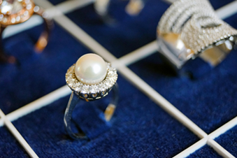 pearl engagement ring on display
