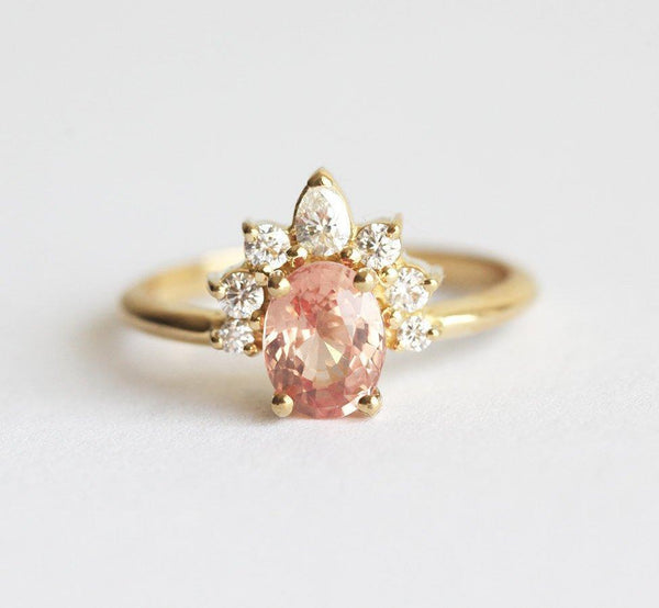 peach sapphire ring with sparky diamond crown