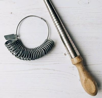 Tools for measuring ring size on a table